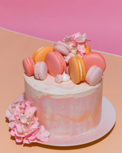 cake with macaroons on top lish creative