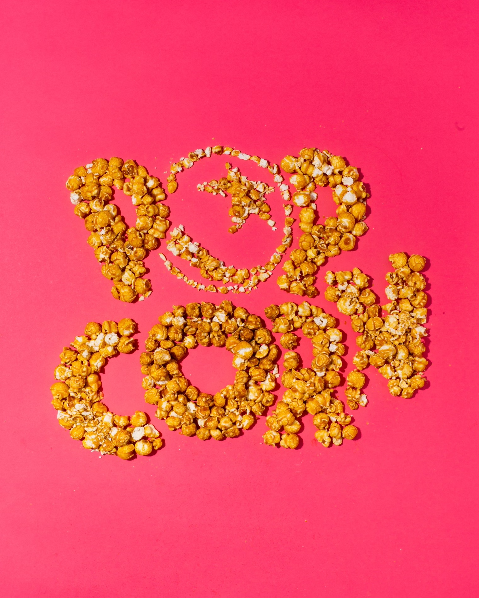 carmel corn laid out to create the pixar popcorn logo