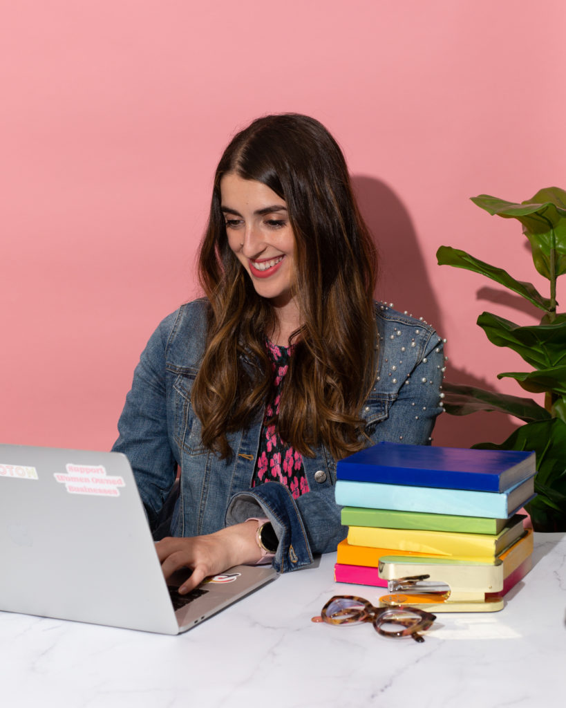 Alisha sitting at desk in front of computer