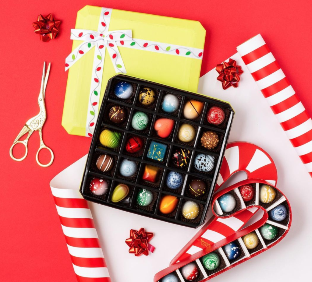 norman love chocolates with christmas wrap lish creative shoot