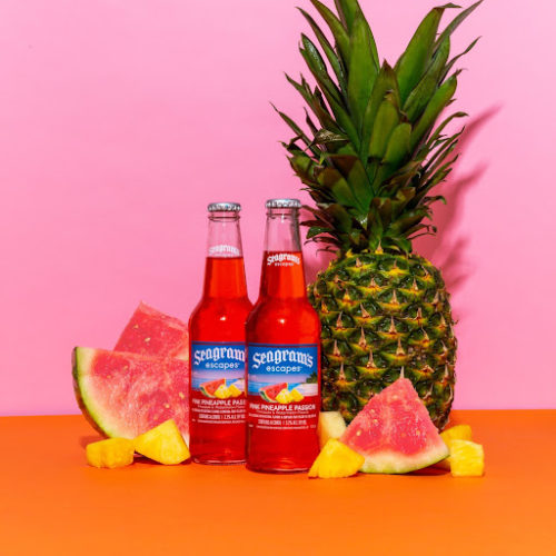 seagram's beverages set next to watermelon and pineapple