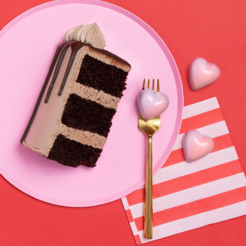 norman love heart-shaped chocolate pictured next to chocolate cake
